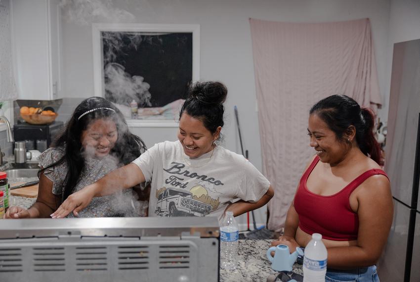 From left: Ester, Abigail and Lisbet talk as they cook at Abigail’s house on Tuesday, June 10, 2025, in Houston. The family gathered to wait for news of Margarita Avila’s interview today at the detention center.

(Lexi Parra for The Texas Tribune)